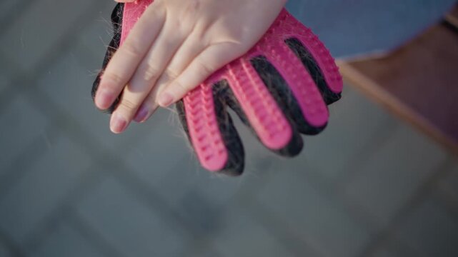 clear presentation of glove features, showcasing intricate details of pink gloves effectively, providing indepth demonstration highlighting specific characteristics of pink glove in detail