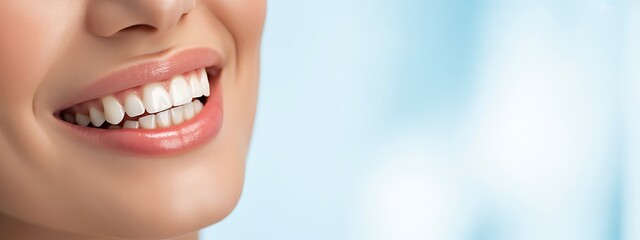 Fototapeta premium Close up of a woman with a bright white smile and pink lips teeth white teeth