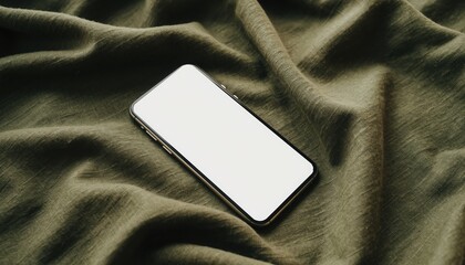 Modern Communication Device: A sleek and contemporary handheld device rests elegantly upon a backdrop of flowing fabric, representing seamless connectivity and digital interaction.