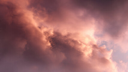 Fototapeta premium Mesmerizing sky with voluminous clouds, bathed in stunning pink, orange, and purple hues, creating a dramatic and captivating natural scene.