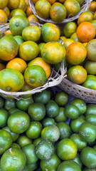 Fresh Tangerine Stack on Basket Market