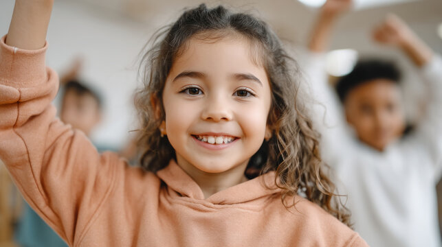 Joyful kids dancing in school gym for fun and fitness activity