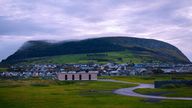 Knocknarea Mountain peak, or Cnoc na Riabh in Irish, also known as the Hill of Kings, rising above the Coolera Peninsula village near Strandhill in Ireland