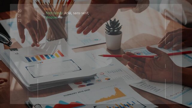 A diverse team engages in a collaborative business meeting, analyzing charts and reports on a wooden table, fostering creativity and strategic planning in a professional environment. Raster