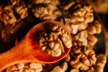 Peeled walnuts in a wooden bowl ready for cooking or snacking