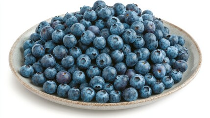 Pile of fresh blueberries on a ceramic plate
