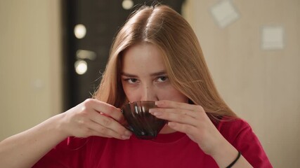 closeup of inviting cookie taste experience, expressive sensory sampling of homemade rustic cookie at table, cozy kitchen scene with woman enjoying flavorful rustic cookie with playful expressions