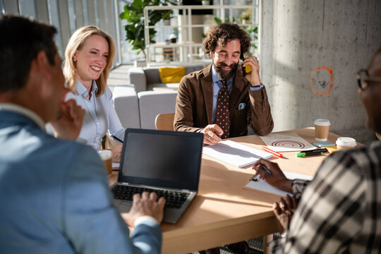 Diverse business professionals having a collaborative office meeting