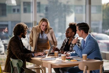 Diverse business team collaborating during meeting in modern office