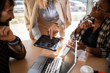 Diverse business team collaborating during office meeting