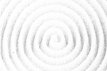 Macro image of a light halftone spiral made of diagonal dots and rings. Printed black pattern on a transparent background PNG.