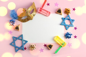 Composition with blank card, decor and hamantaschen cookies for Purim holiday on pink background. Banner for design