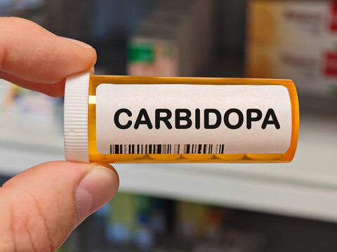 Box of CARBIDOPA tablets on a hospital pharmacy table used with levodopa to treat Parkinson disease a decarboxylase inhibitor.