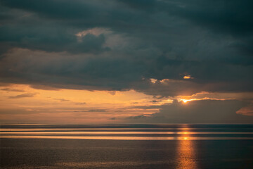 Baltic Sea sunset reflecting golden light on water
