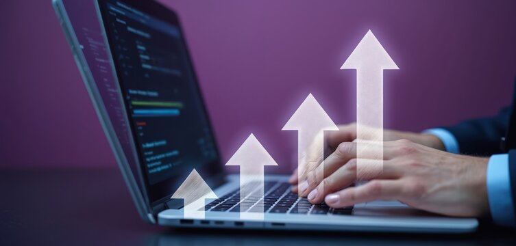 Business growth concept. Person types on laptop keyboard with upward arrows graphic overlay. Digital progress displayed on screen against purple background. Data analysis drives success.
