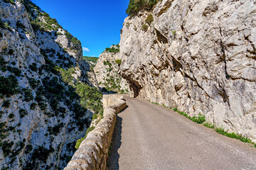 Driving through the amazing Gorges de Galamus, Aude, Eastern Pyrenees, Languedoc Roussillon, France.