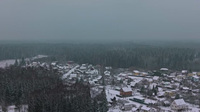Winter village scenery, Charming winter landscape with snowdusted homes and surrounding woodland