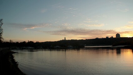 Naklejka premium sunset over the river