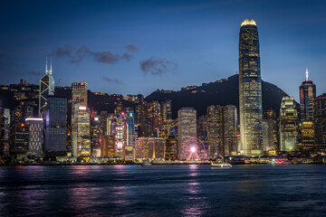 Scenic, awesome view of Victoria Harbour and Hong Kong's fantastic skyline with its impressive skyscrapers illuminated at night, Hong Kong, China