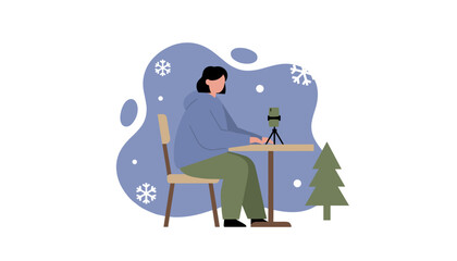 Woman recording a winter vlog outdoors on a smartphone tripod