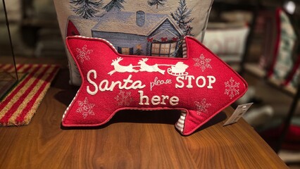 Festive christmas decor with santa stop here pillow for holiday home design