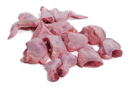 Cut the raw chicken into 12 pieces: legs, breast, and wings.