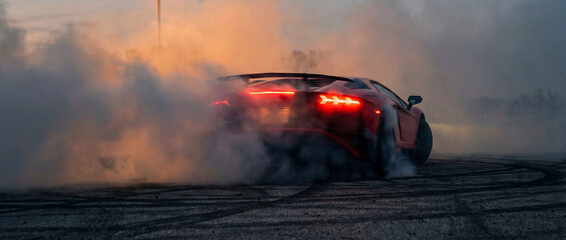 Red V8 sports car spinning through dense tire smoke, dramatic and high-energy.