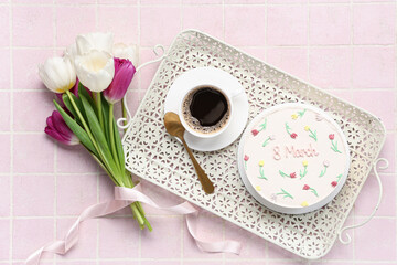 Sweet bento cake with cup of coffee and beautiful tulips on pink tile background. International Women's Day
