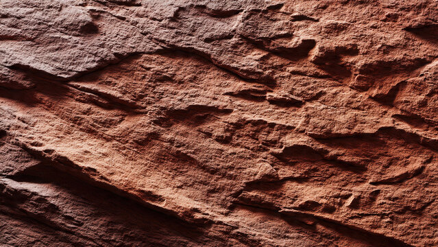 A detailed close-up of rugged, reddish-brown rock formations, revealing intricate textures, cracks, and natural layering with dramatic lighting and shadows.