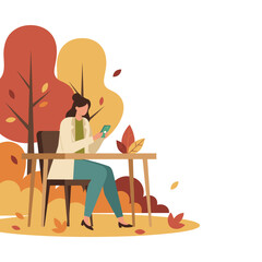 A woman uses her smartphone at an outdoor table amidst beautiful autumn foliage Remote work concept