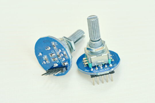 Variable resistor isolated on background. Electronic parts concept. potentiometer.