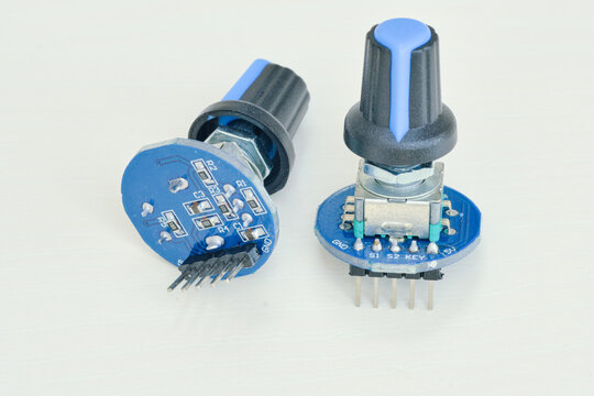 Variable resistor isolated on white background. Electronic parts concept. potentiometer.