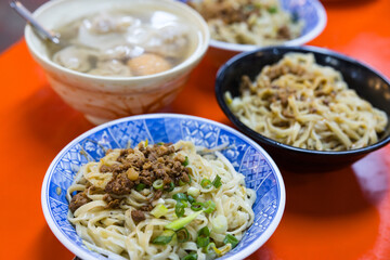 Taiwanese braised pork noodles served in bowl