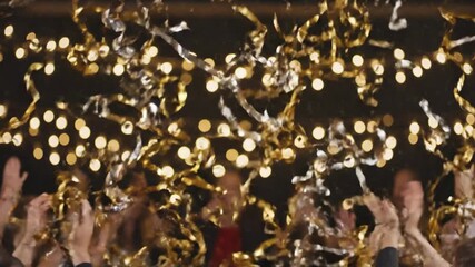 Celebration event festive confetti falling gold silver streamer background