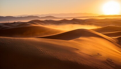desert landscape at sunrise with sand dunes and mist