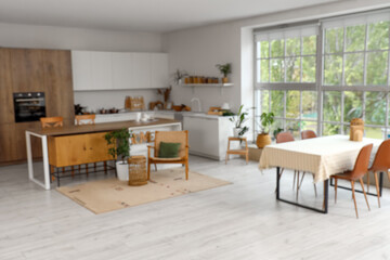 Blurred interior of light modern  kitchen