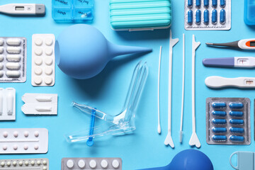 Set of gynecological supplies on blue background
