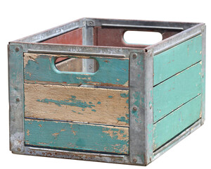 An old wood and metal crate box with teal pealing paint with a blank background.
