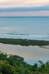 Sunste with lake, forest and beach