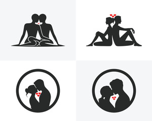 Four black silhouette icons of couples in romantic poses with red hearts love romance