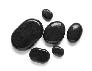 Composition with wet spa stones isolated on white background