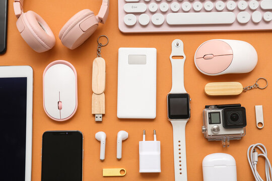 Composition with various modern devices on color background