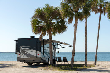 Florida travel destination. Motorhome recreational vehicle on seaside.