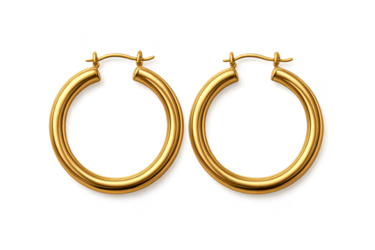 Elegant pair of shiny gold hoop earrings isolated on transparent background