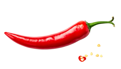 Shiny red chili pepper with stem, seeds, against black background
