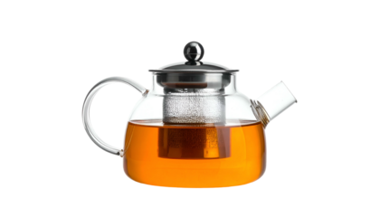 Glass teapot with golden liquid inside