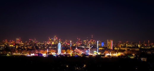 Naklejka premium London Skyline and Christmas Fair in Hyde Park at Twilight