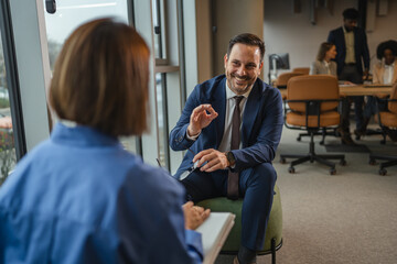 Business man having a creative discussion with colleague