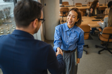 Business people shaking hands sealing a collaboration agreement