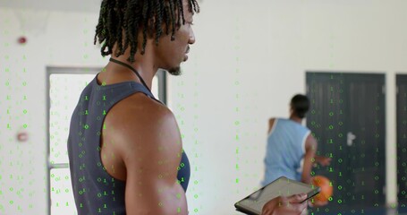 Holding tablet coach in sleeveless top guiding woman with basketball in studio, binary overlay